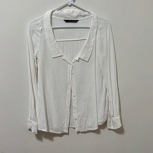 Lower cut button down